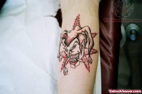 Joker Face Tattoo On Arm