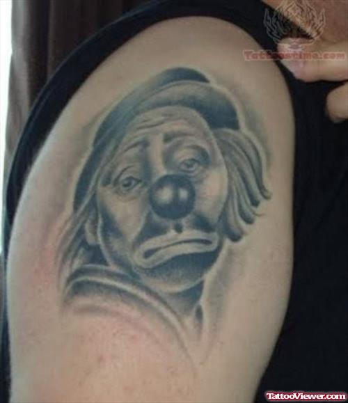 Unhappy Joker Tattoo On Shoulder