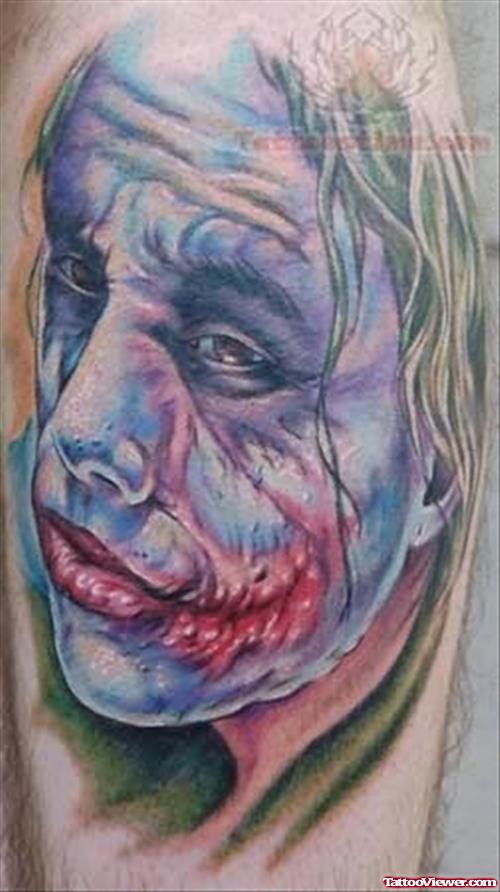 Injured Joker Face Tattoo