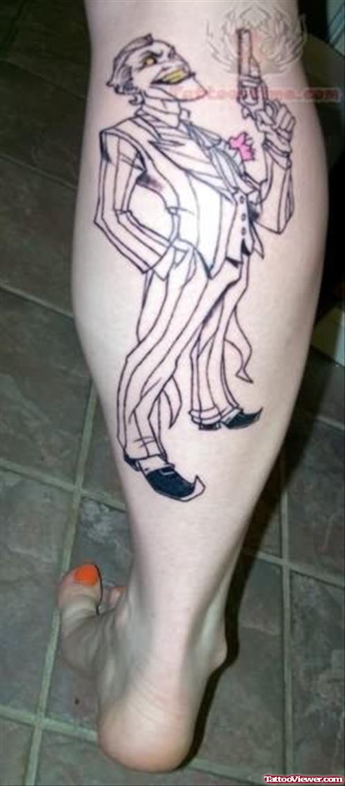 Joker With Gun Tattoo On Leg