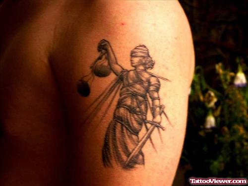 Grey Ink Lady Justice Tattoo On Left Shoulder