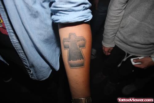 Grey Ink Cross Justice Tattoo On Arm