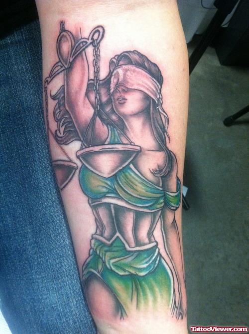 Color Ink Justice Tattoo On Arm