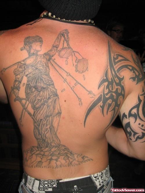 Black Tribal And Justice Tattoo On Back Body