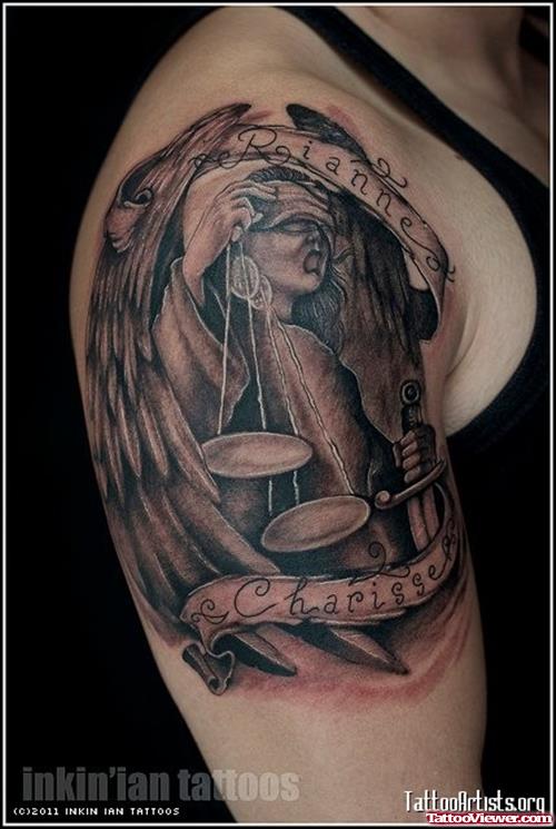 Amazing Grey Ink Justice Tattoo On Man Right Shoulder