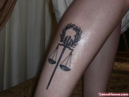 Justice Tattoo On Right Leg