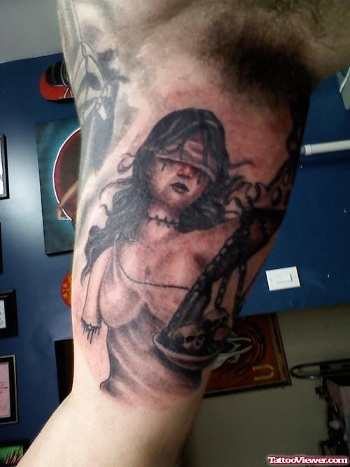 Grey Ink Lady Justice Tattoo On Right Inner Bicep