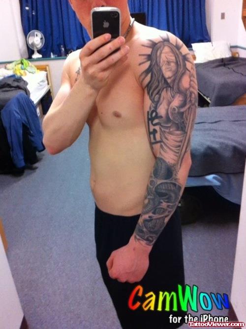 Grey Ink Justice Tattoo On Man Left Sleeve
