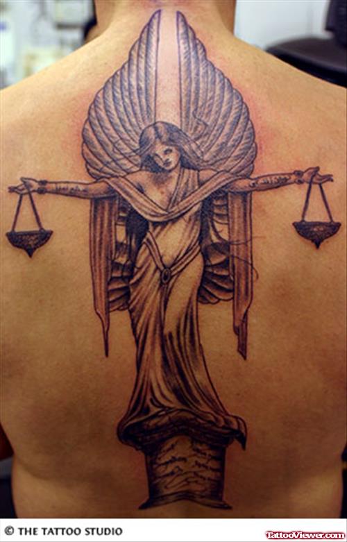 Awful Grey Ink Justice Tattoo On Back