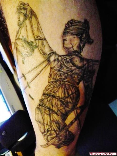 Amazing Grey Ink Justice Tattoo On Sleeve