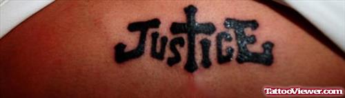 Black Ink Justice Tattoo On Back