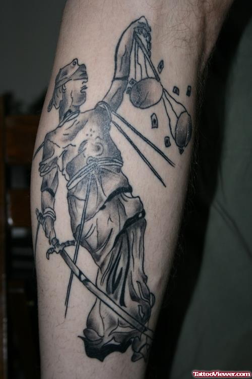 Grey Ink Justice Tattoo On Right Arm