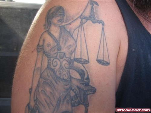 Grey Ink Justice Tattoo On Man Right Half Sleeve