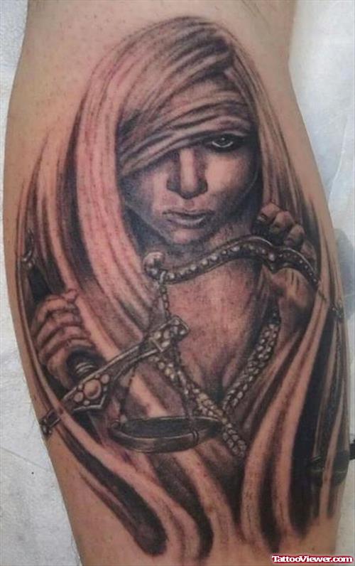 Amazing Grey Ink Justice Tattoo On Leg