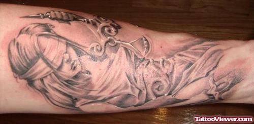 Mythical Justice Tattoo On Arm