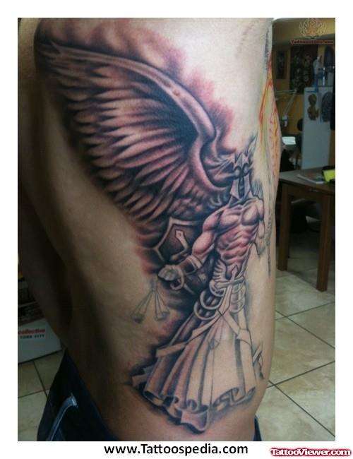 Grey Ink Angel Justice Tattoo On Side Rib