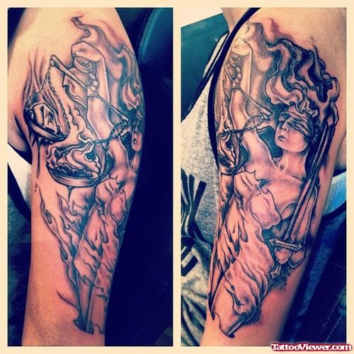 Awful Grey Ink Justice Tattoo On Half Sleeve