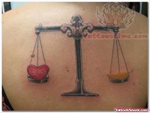 Justice Balance Tattoo On Back