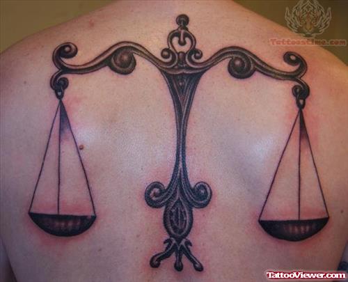 Justice Balance Tattoo On Upper Back