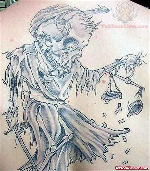 Justice Skull Tattoo On Back