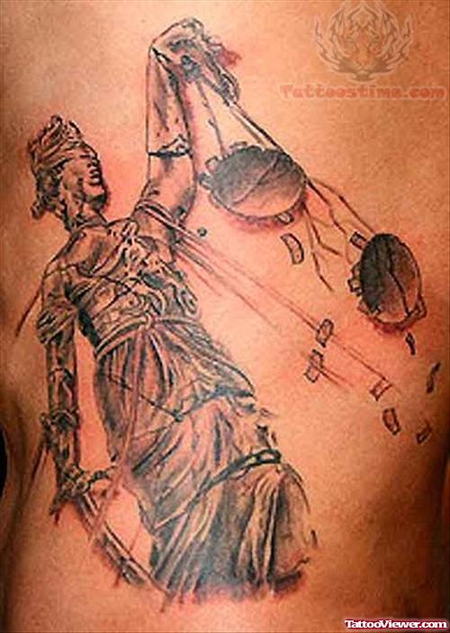 Justice Tattoo On Rib