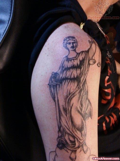 Justice Tattoo On Muscles
