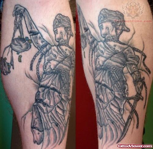 Justice Tattoo On Leg
