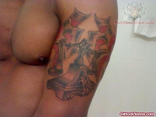 Justice Tattoo On Bicep