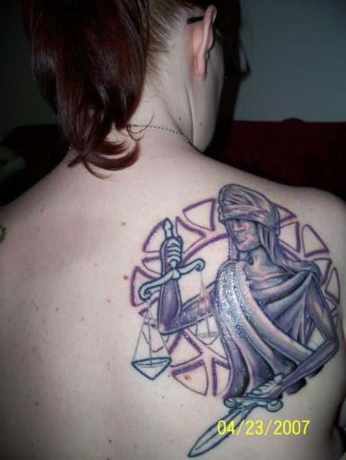 Justice Tattoo On Right Back Shoulder