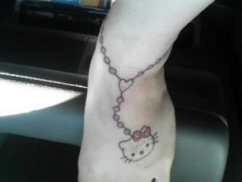 Hello Kitty Head Rosary Tattoo On Ankle