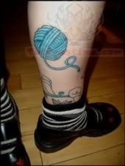 Blue Yarn Ball Kniiting Tattoo On Back Leg