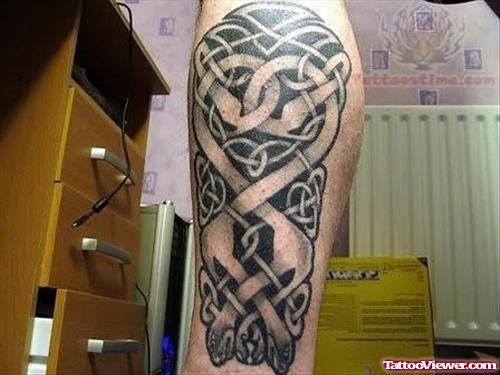 Elegant Black Ink Knot Tattoo