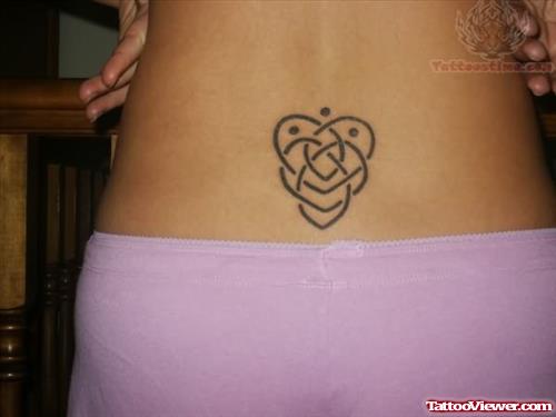 Small Knot Tattoo On Lower Back
