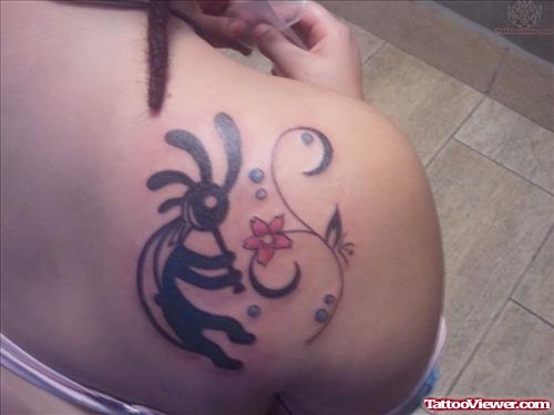 Kokopelli Tattoo On Girl Shoulder