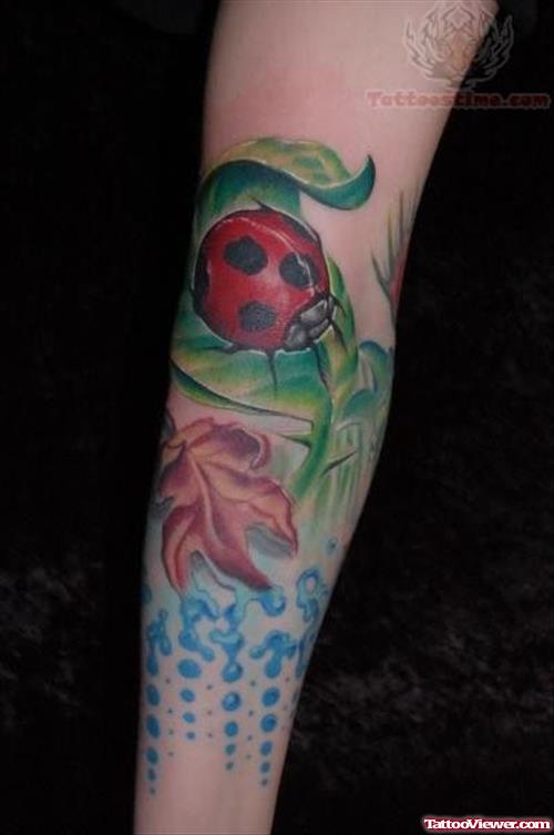 Ladybug Arm Tattoo