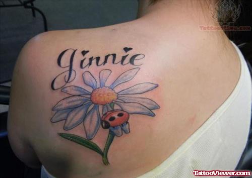 Daisy Flower And Ladybug Tattoo