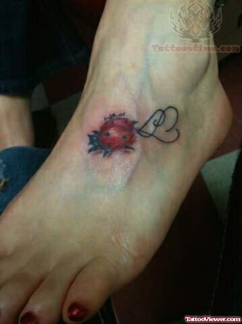 Ladybug On Foot Tattoo