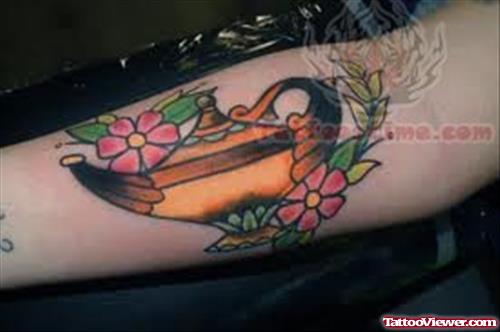 Flower And Magic Lamp Tattoo On Arm