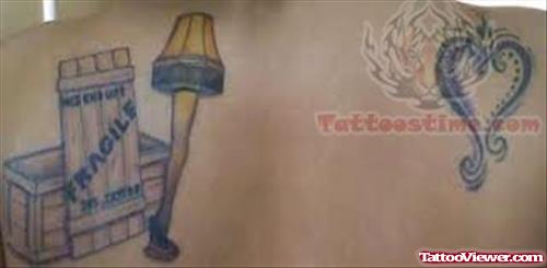 Lamp And Heart Tattoo On Back