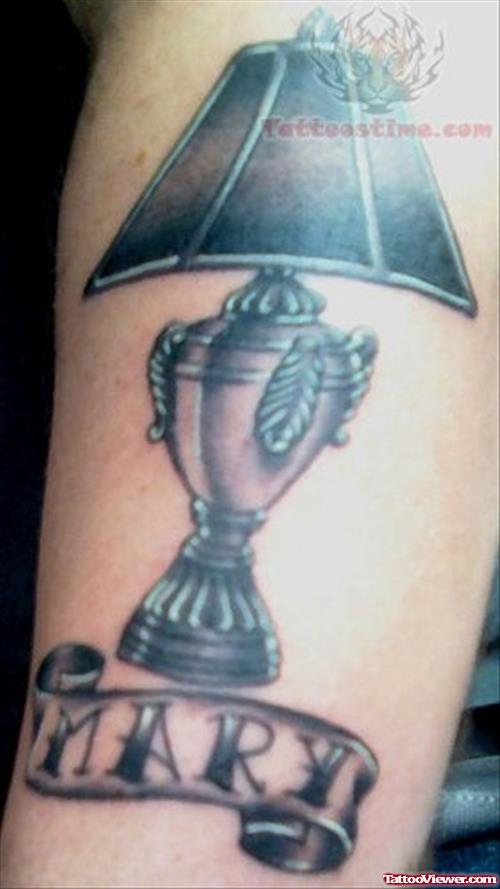 Grey Ink Lamp Tattoo