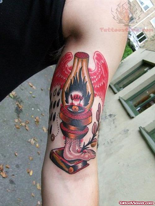 Winged Lamp Tattoo On Sleeve