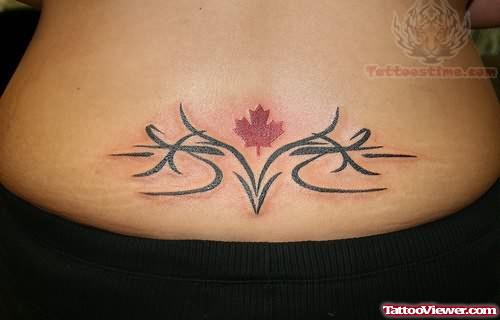 Small Leaf Tattoo On Lower Back