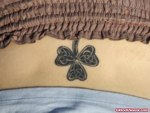Shamrock Leaf Tattoo On Lower Back