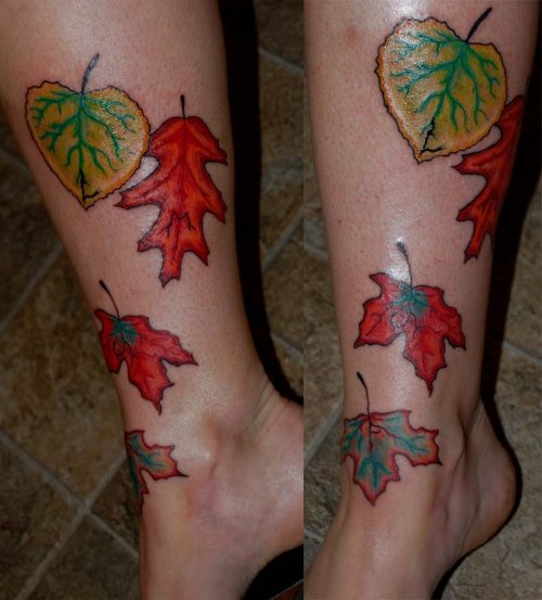 Colored Leaf Tattoos On Legs