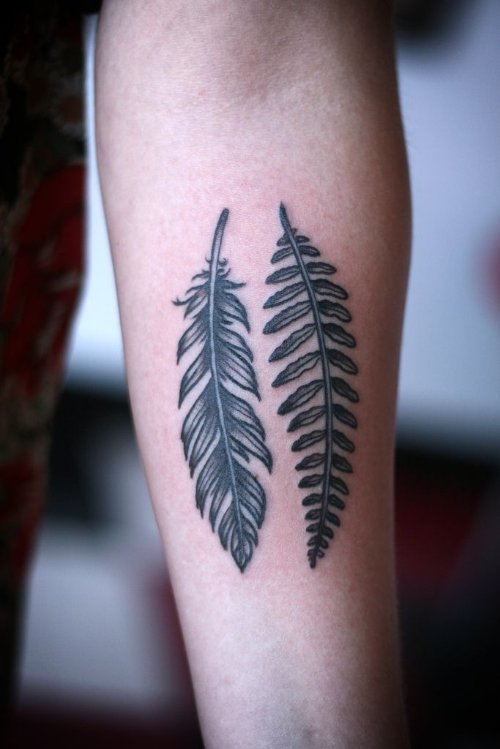 Grey Ink Leaf And Feather Tattoo On Arm