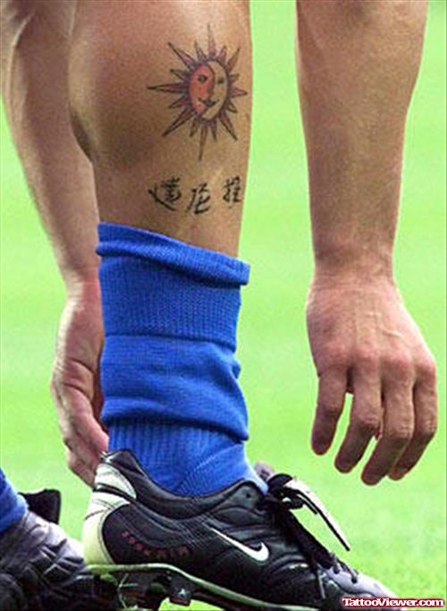 Tribal Sun Leg Tattoo