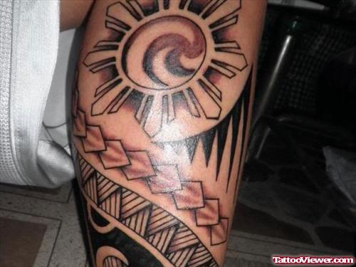 Sun And Polynesian Leg Tattoo