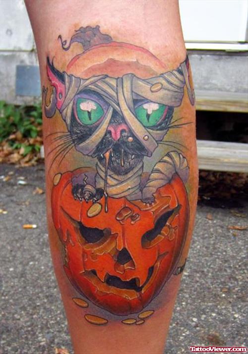 Halloween And Cat Head Back Leg Tattoo
