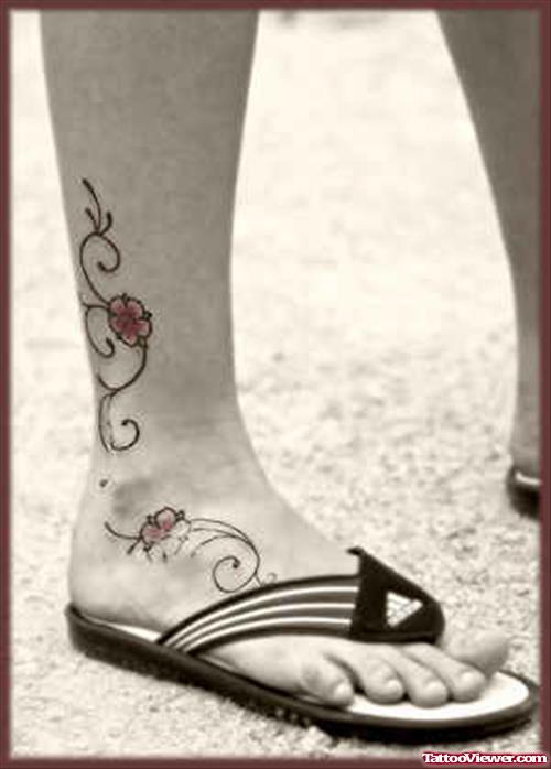 Flower Tattoo On Girl Leg And Foot
