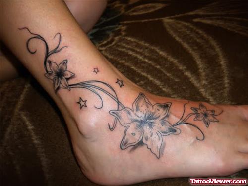 Grey Ink Swirl And Flowers Leg Tattoo